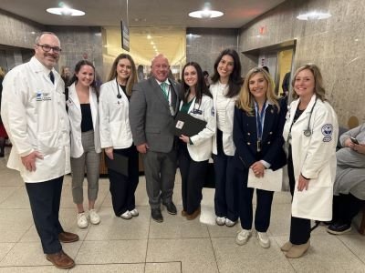 MWU student and faculty member with state lawmakers